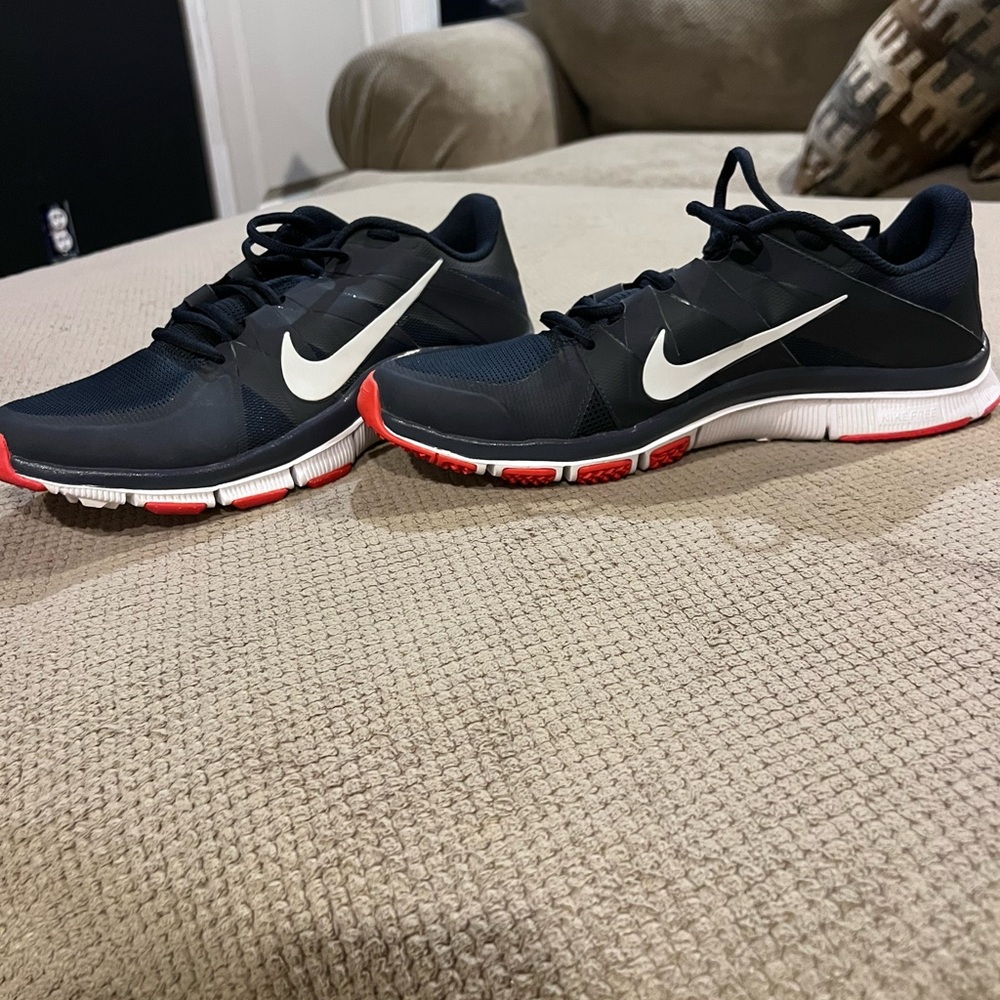 Nike Black and White Running Shoes with Red Soles